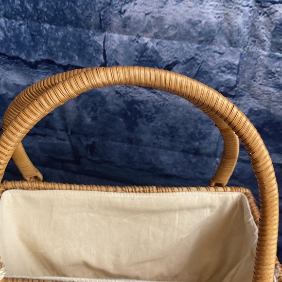 Crescent Woven Handbag with tassel detail and cinch bag interior - Picture 3 of 11